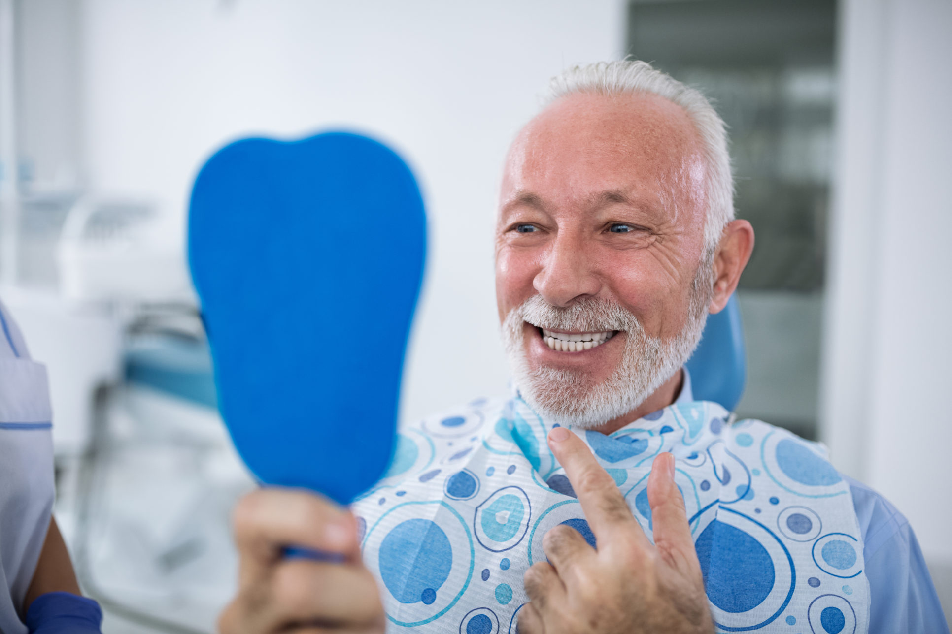 Smiling and satisfied patient after treatment