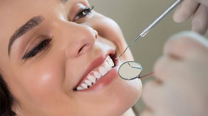 Smiling Woman During Dental Cleaning